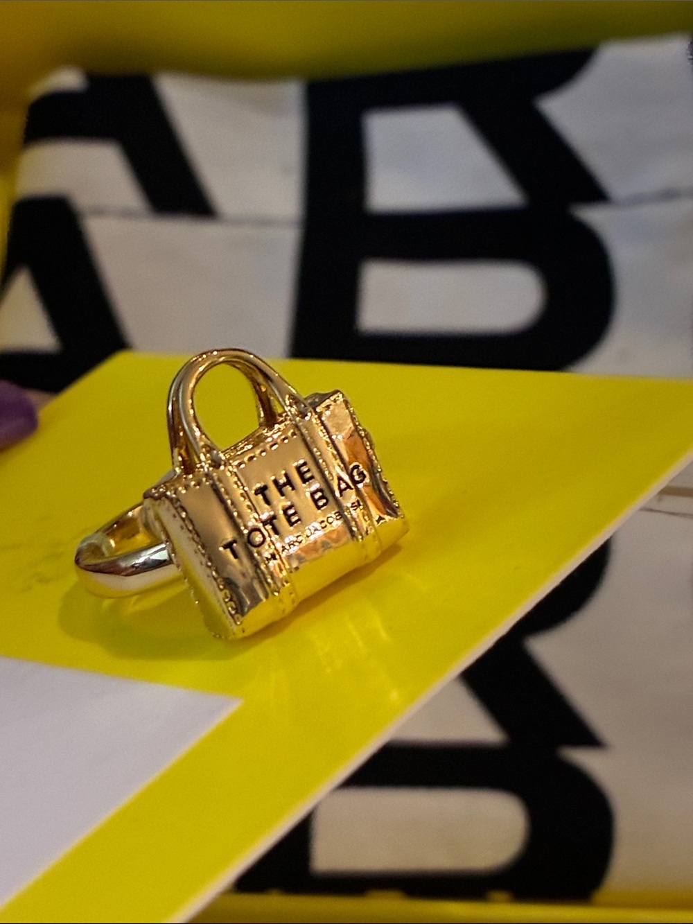 Marc Jacob’s Tote bag gold ring